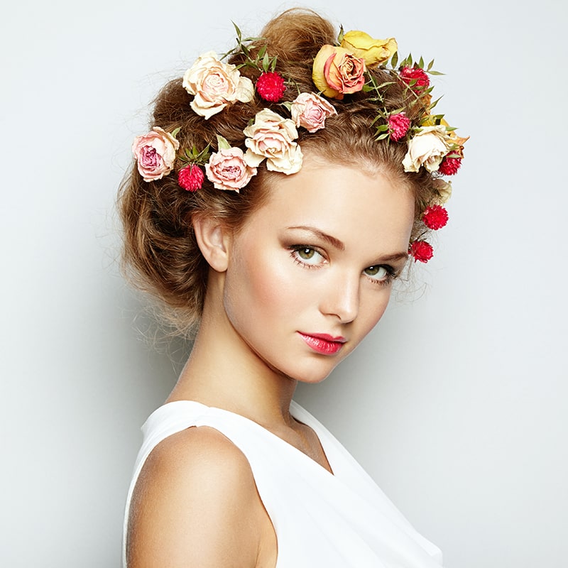 beautiful-woman-with-flowers-perfect-face-skin-bea-P2JJRXZ-min.jpg